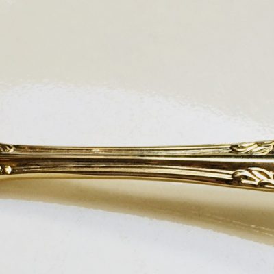 Gold designed sugar ladle